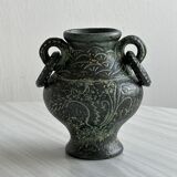 Green face vase.