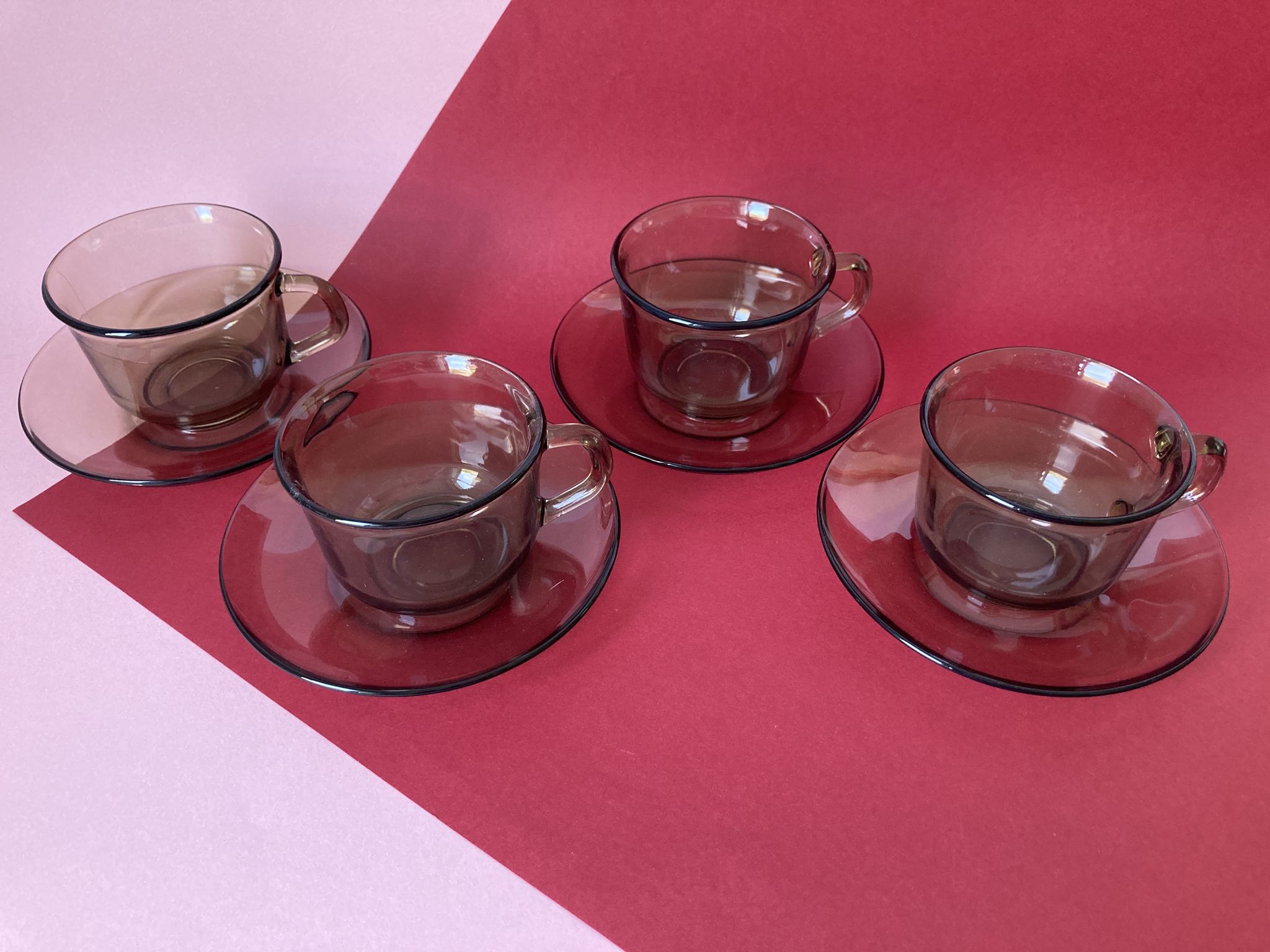 4 Arcoroc coffee cups and saucers in black transparent glass