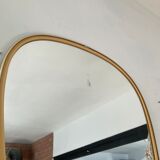Free-form asymmetrical mirror from the 60s and 70s