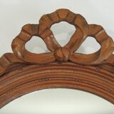 Antique oval mirror in carved wood – Louis XVI style, ribbon bow decoration, mid