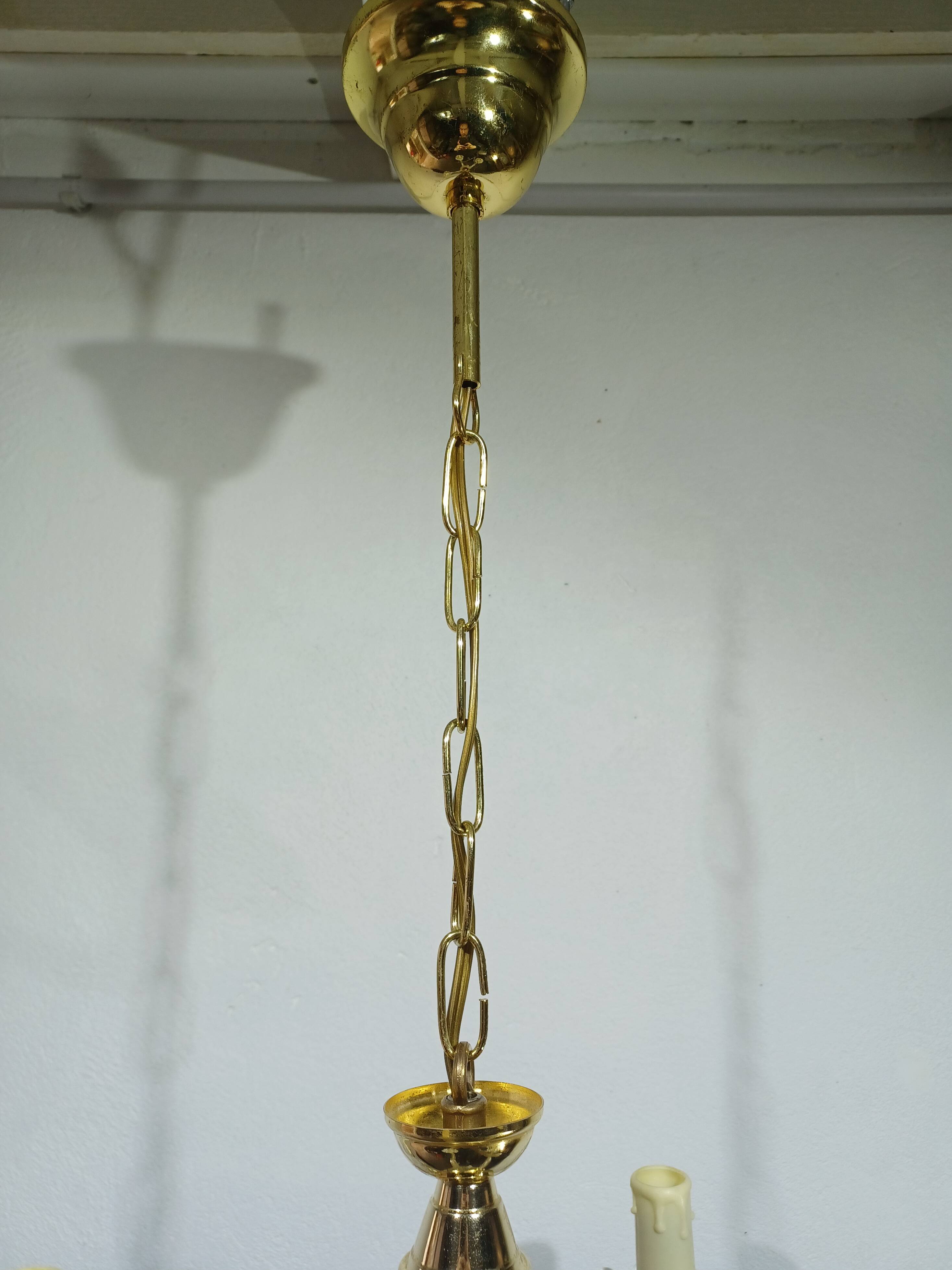 4-light glass and brass chandelier