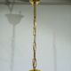 4-light glass and brass chandelier