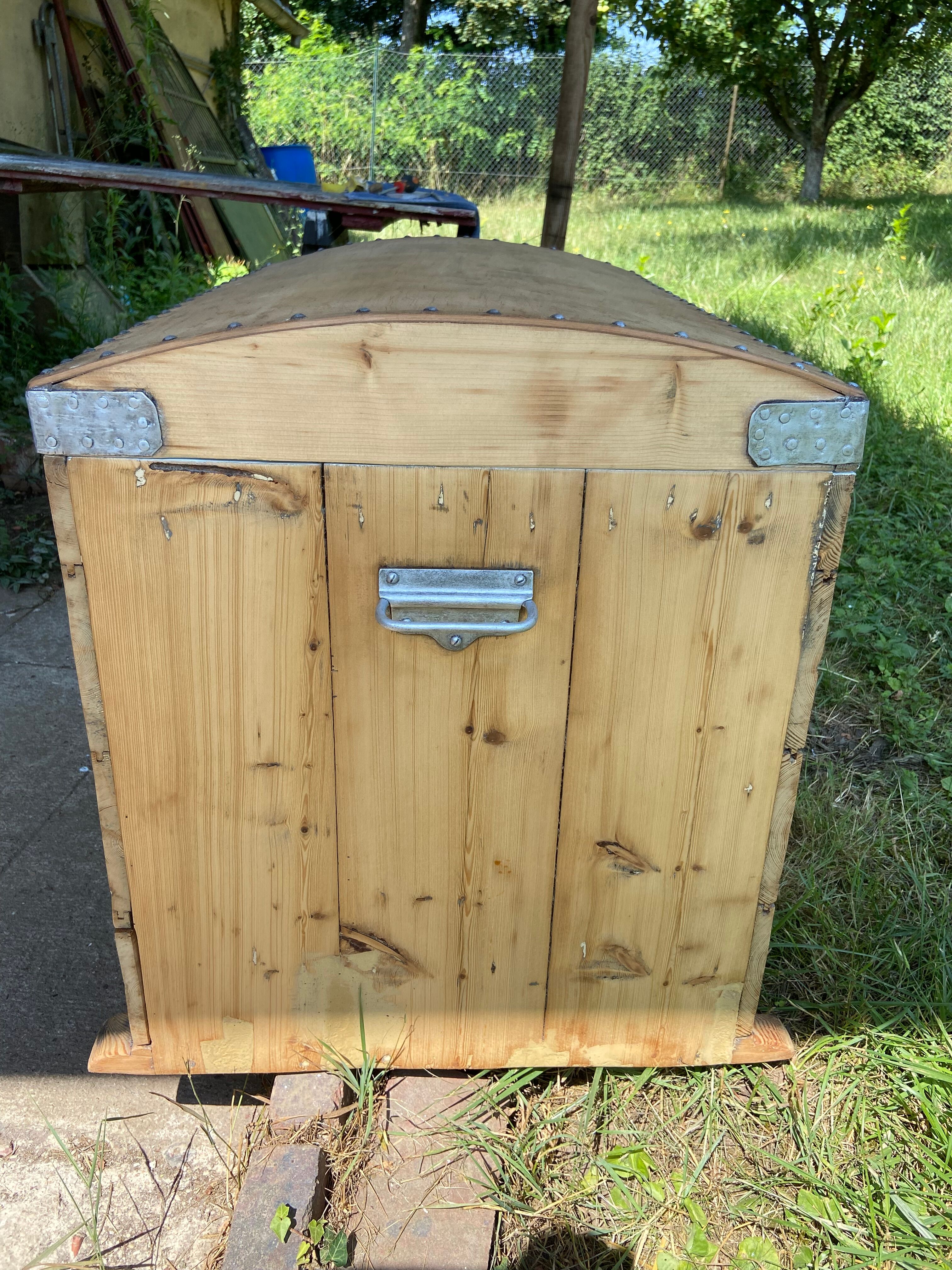 Raw wooden chest with a secret drawer