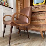 Mid-Century Scandinavian vintage retro armchair with oval armrests.