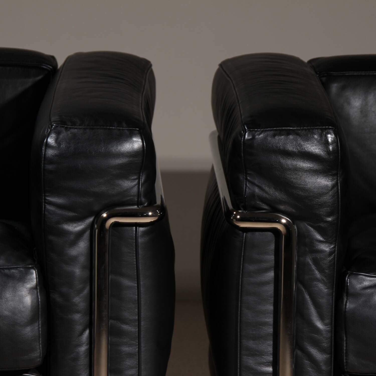 Two ‚LC2‘ Armchairs by Le Corbusier, P. Jeanneret, C. Perriand for Cassina