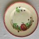 Plat rond en terre de fer Jules Vieillard