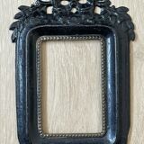 Black metal frame knot and laurel branch