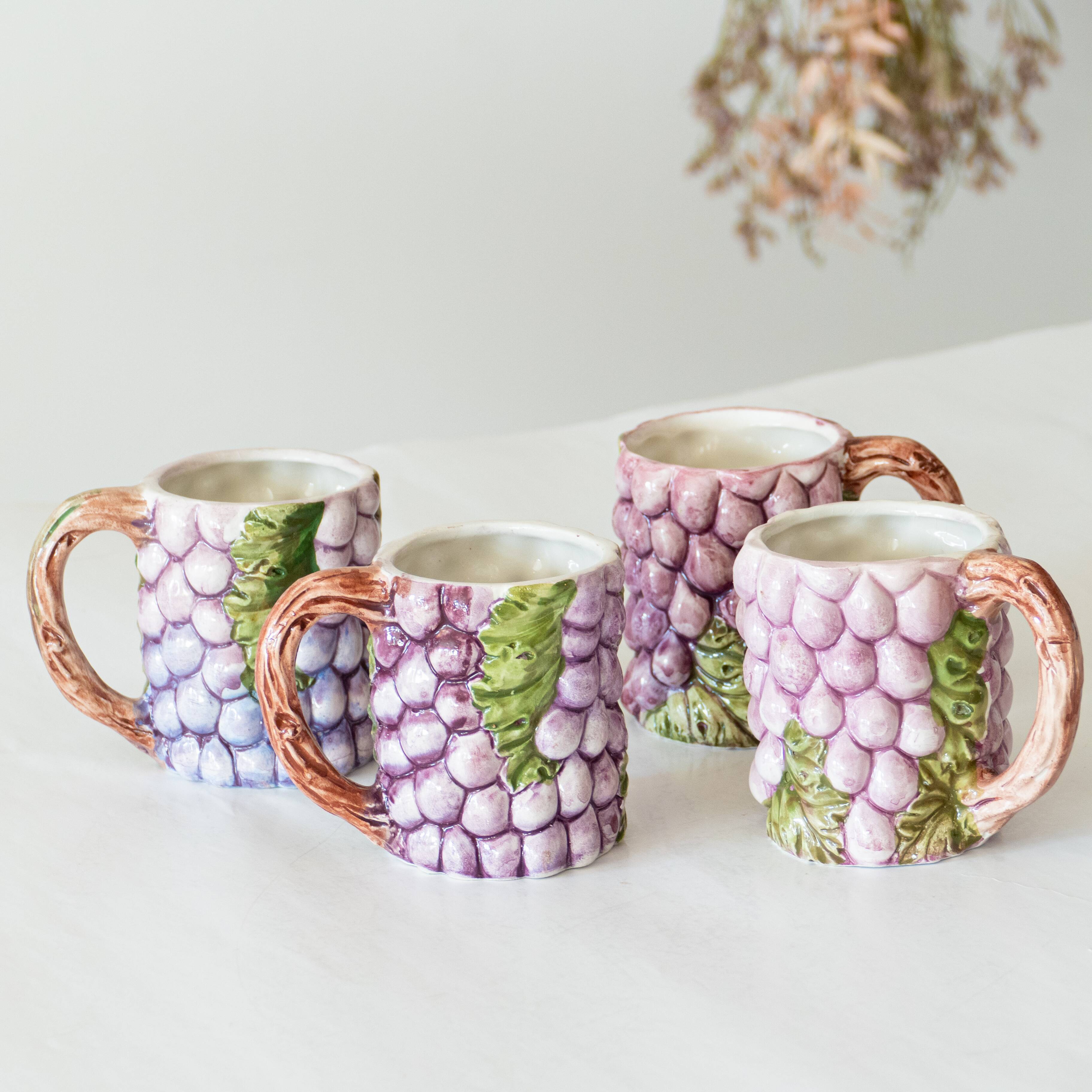 4 old mugs in Bassano slip signed