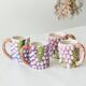 4 old mugs in Bassano slip signed