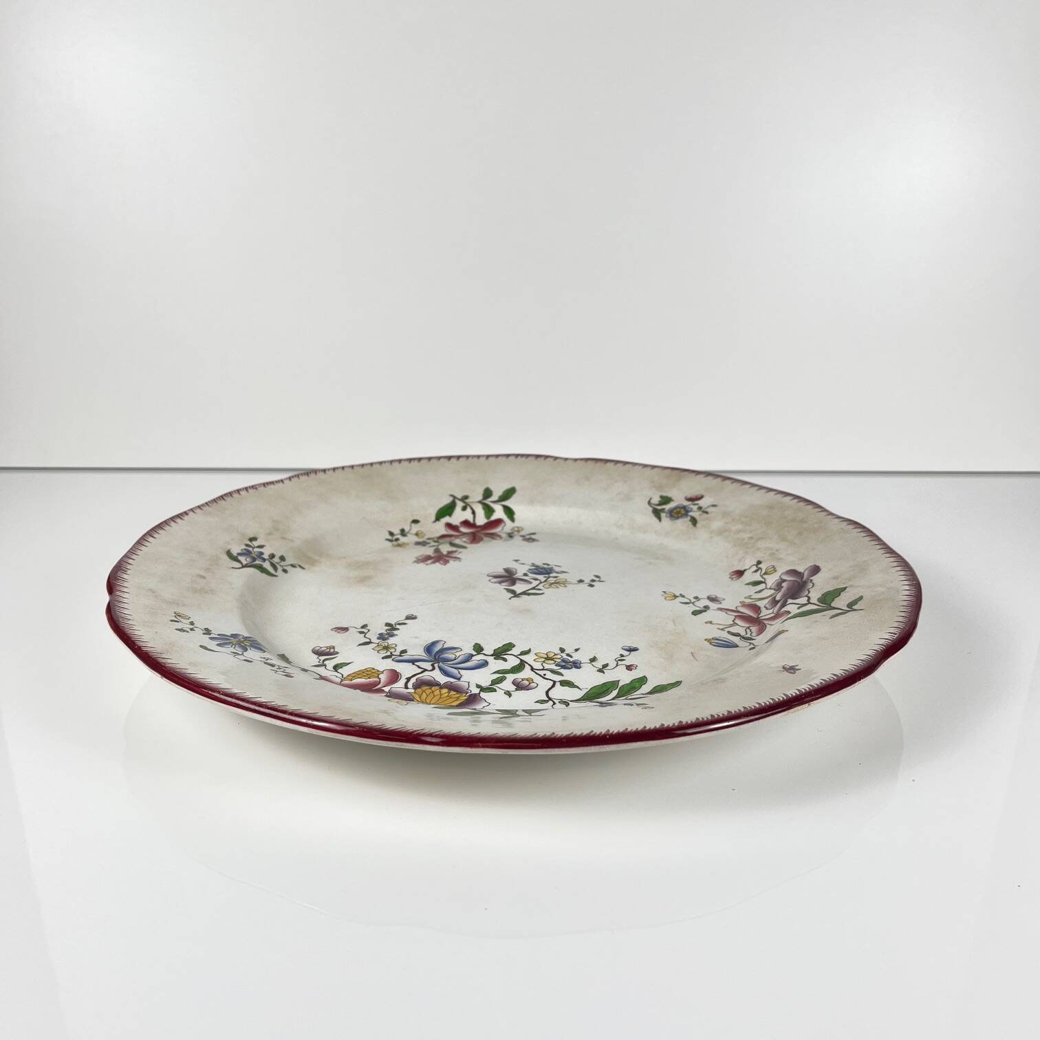 Large round patinated dish, Strasbourg model, Sarreguemines, 1880-1918