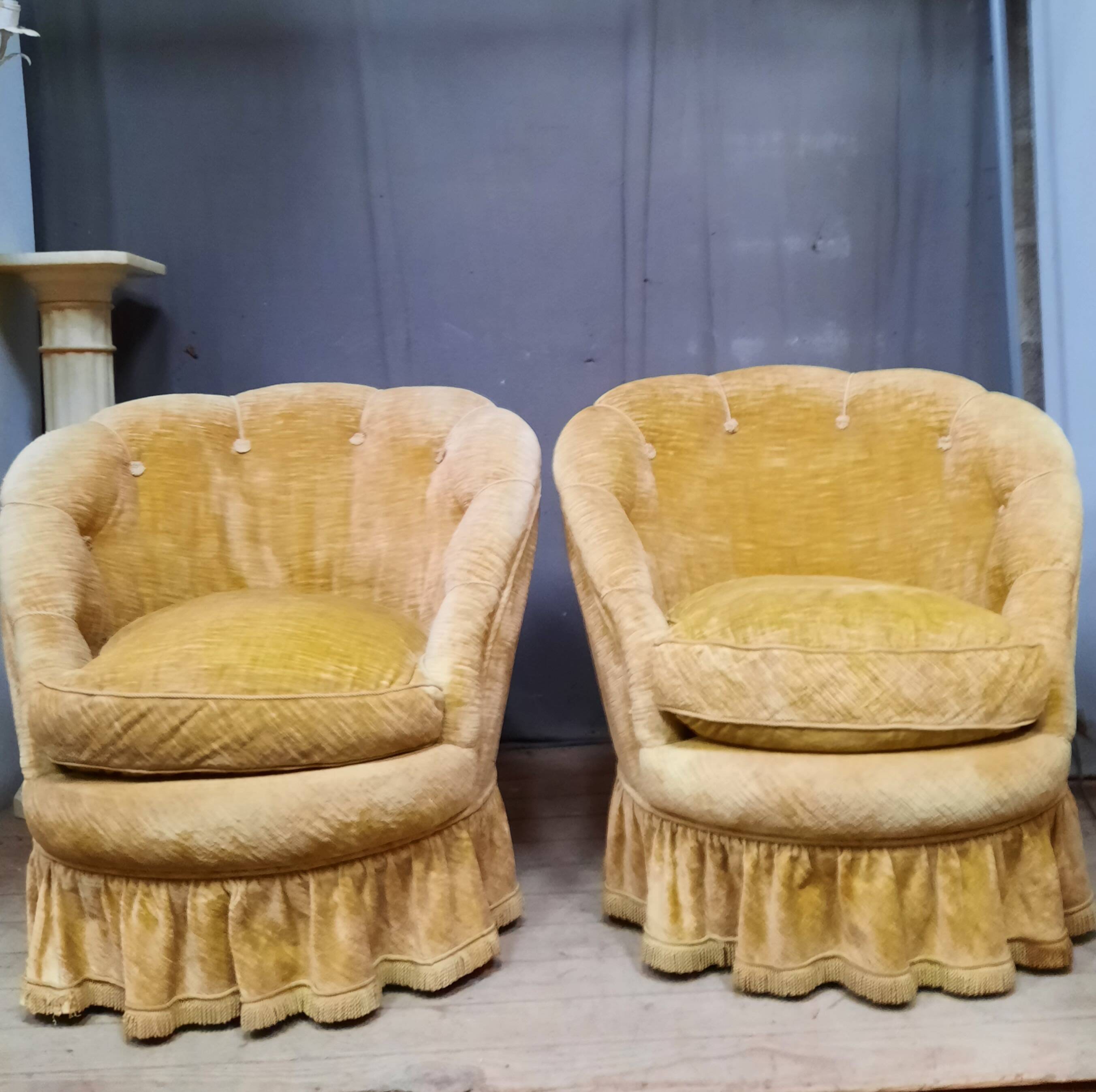 Pair of flared back toad armchairs