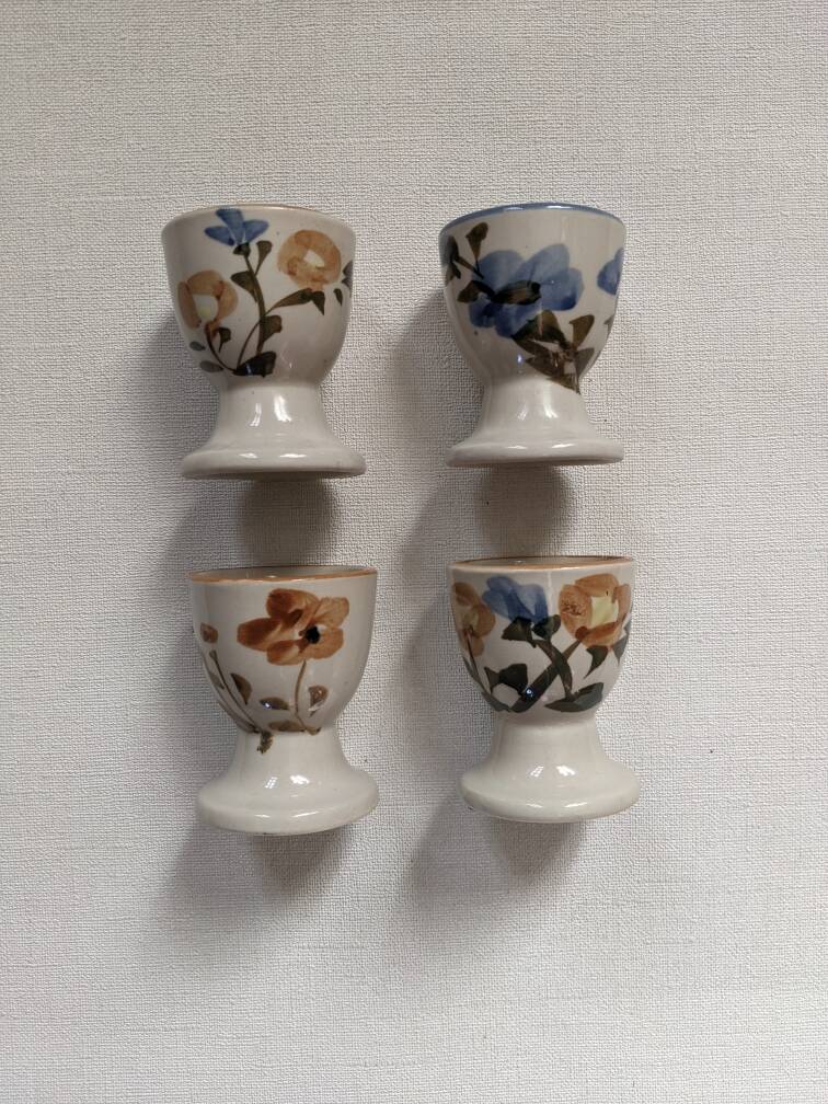Ceramic egg cups with hand-painted floral decoration, stoneware, bohemian countryside