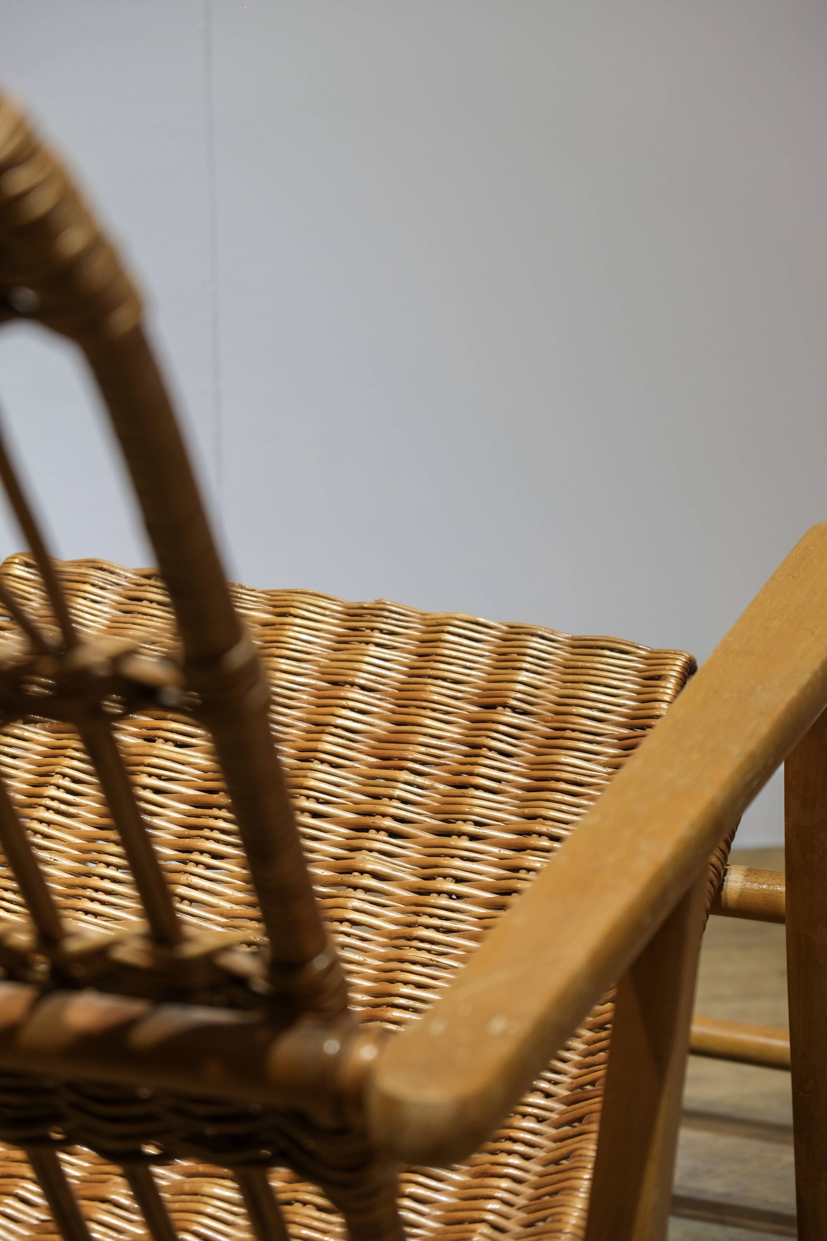 Wicker and wood rocking chair