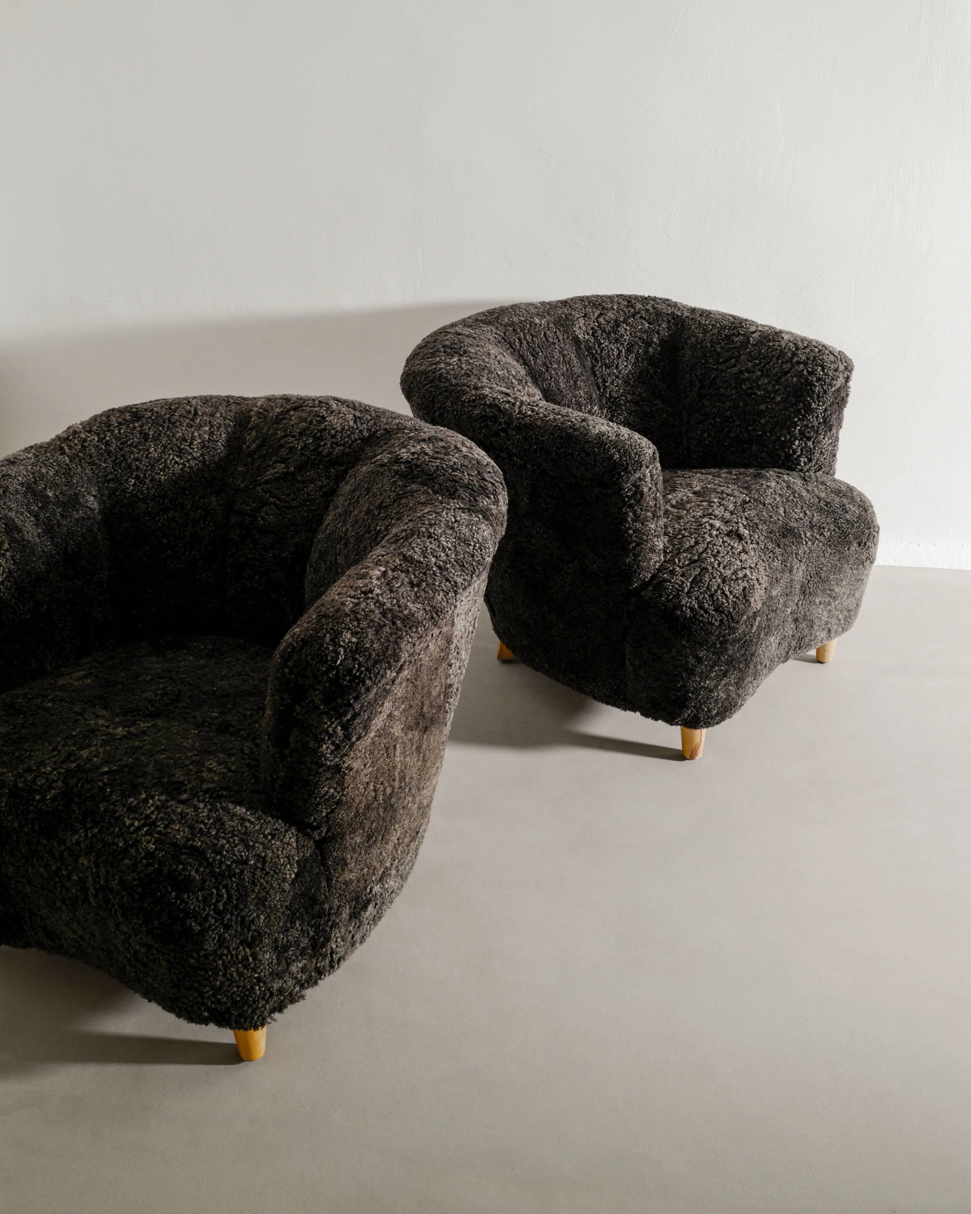 Pair of Swedish Curved Mid Century Modern Armchairs in Dark Sheepskin 1940s