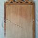 Wooden hanging mirror with vintage carved knot