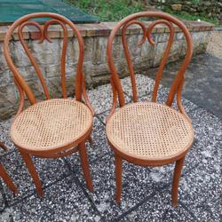 4 tanned bistro chairs