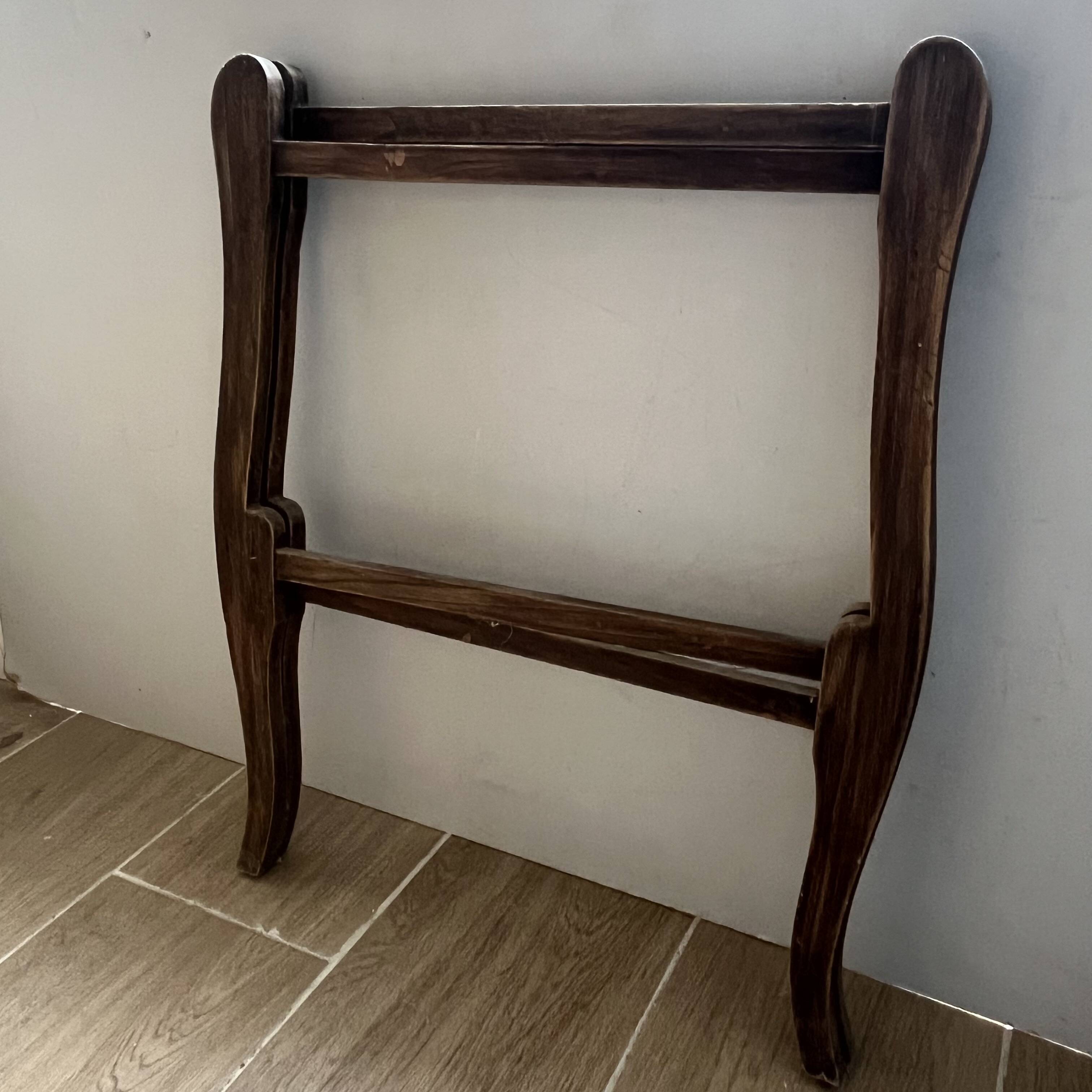 Two old trays on a stand/console.