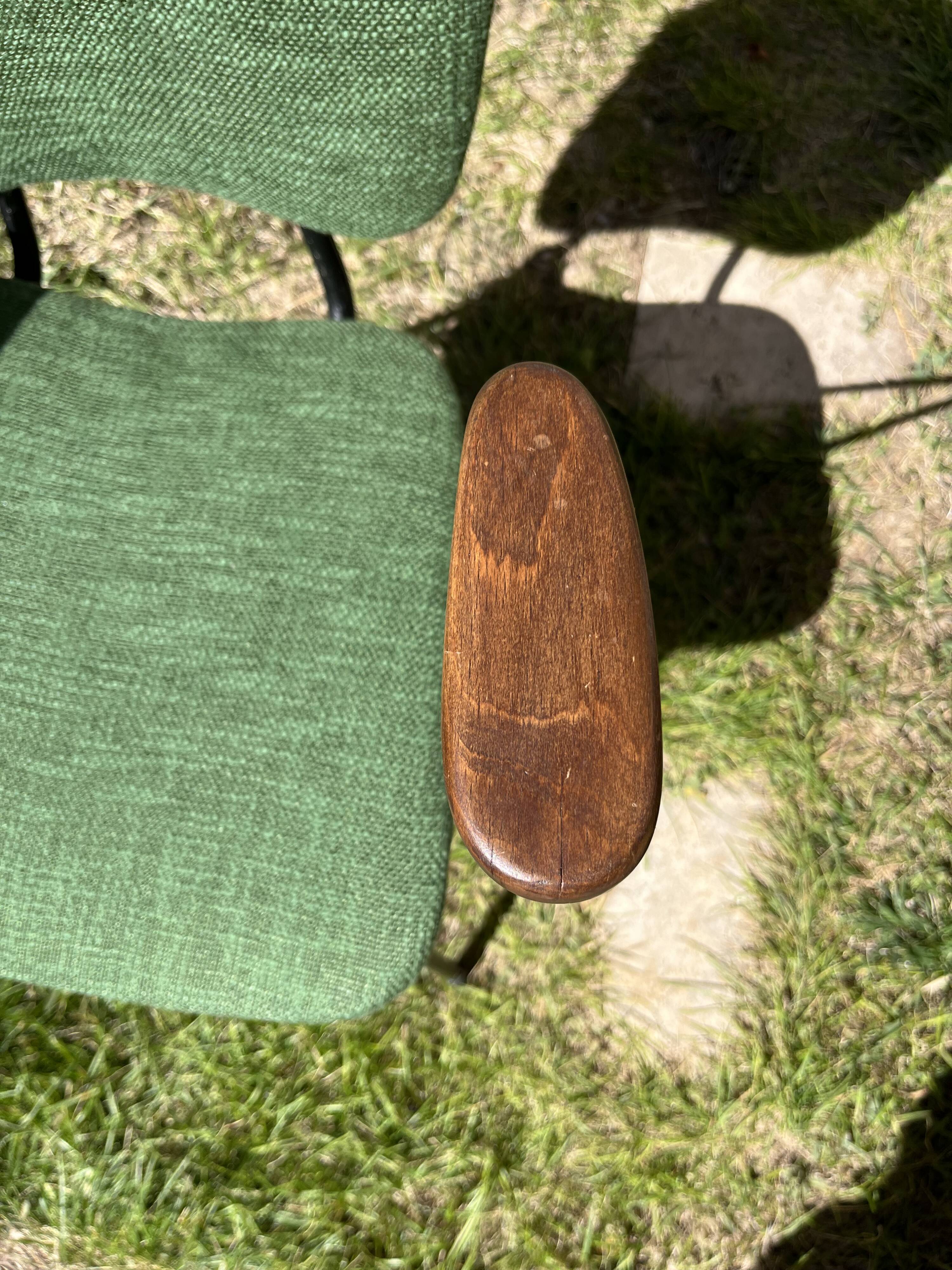 50s chair with armrests.