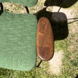 50s chair with armrests.