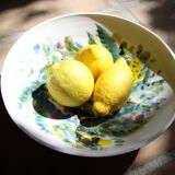 Decorated white earthenware fruit bowl