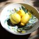 Decorated white earthenware fruit bowl