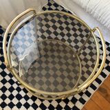 Vintage gold glass table on wheels