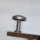 Retro vintage coat rack with 4 aluminum hooks on a wooden frame