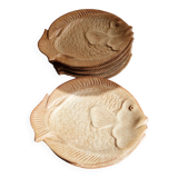 Deep plates in the shape of fish in stoneware