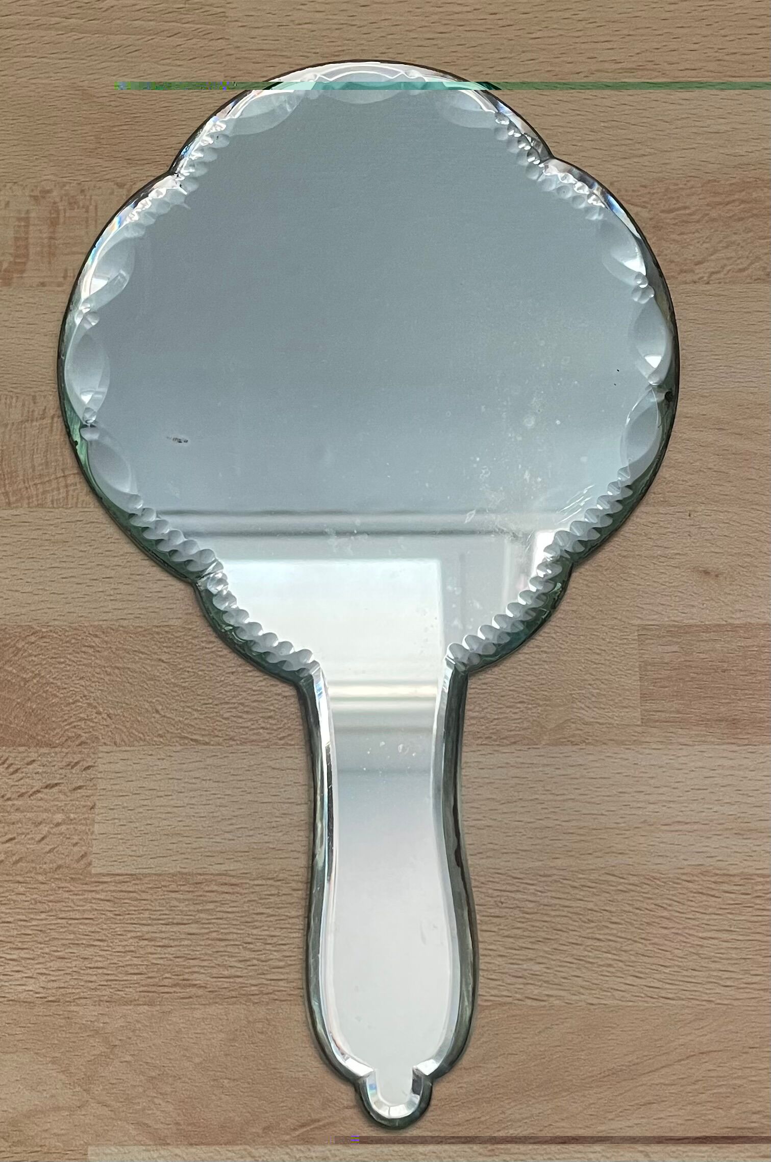 Beveled hand mirror