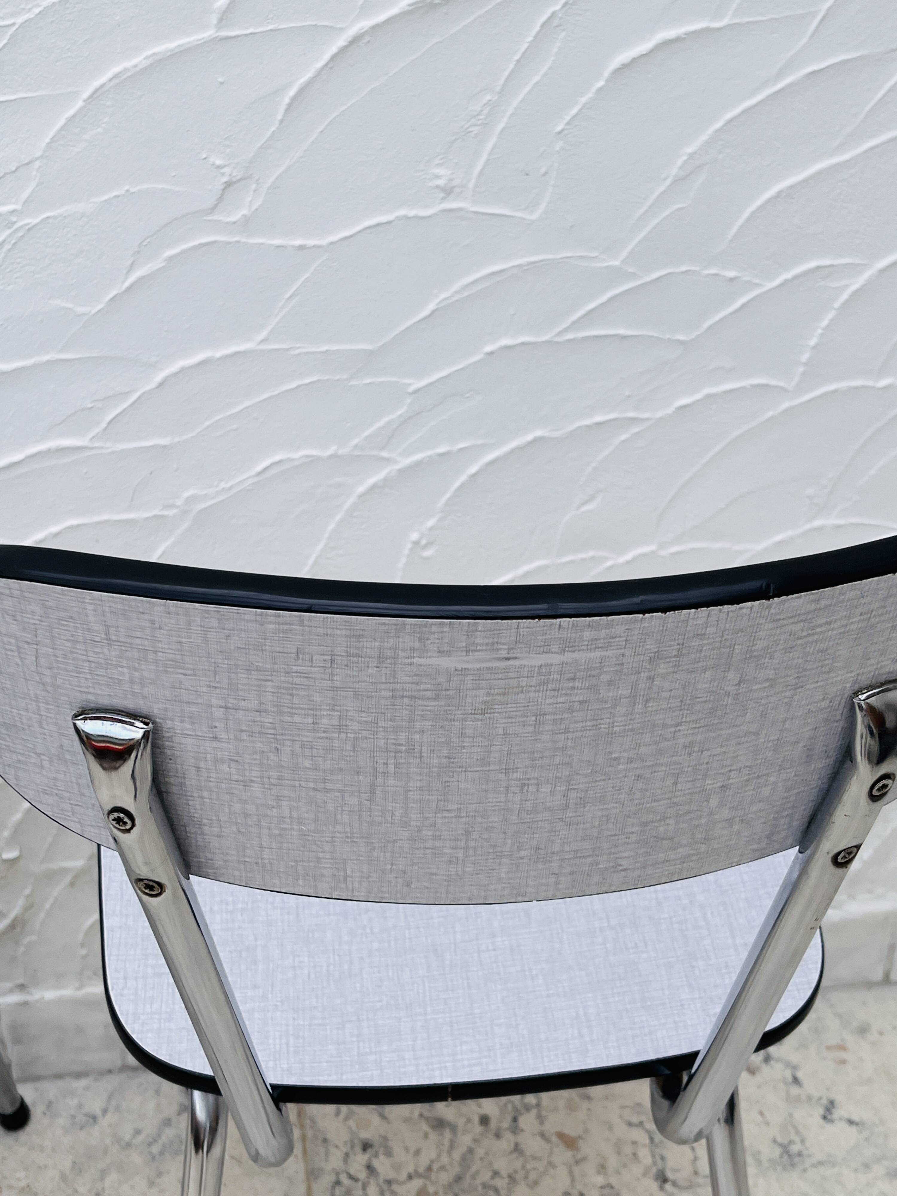 Two Formica chairs