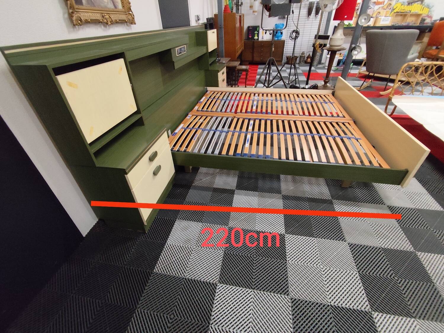 Vintage king-size bed with headboard furniture and built-in radio.