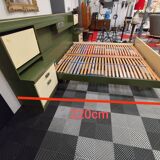 Large vintage bed with headboard furniture and built-in radio