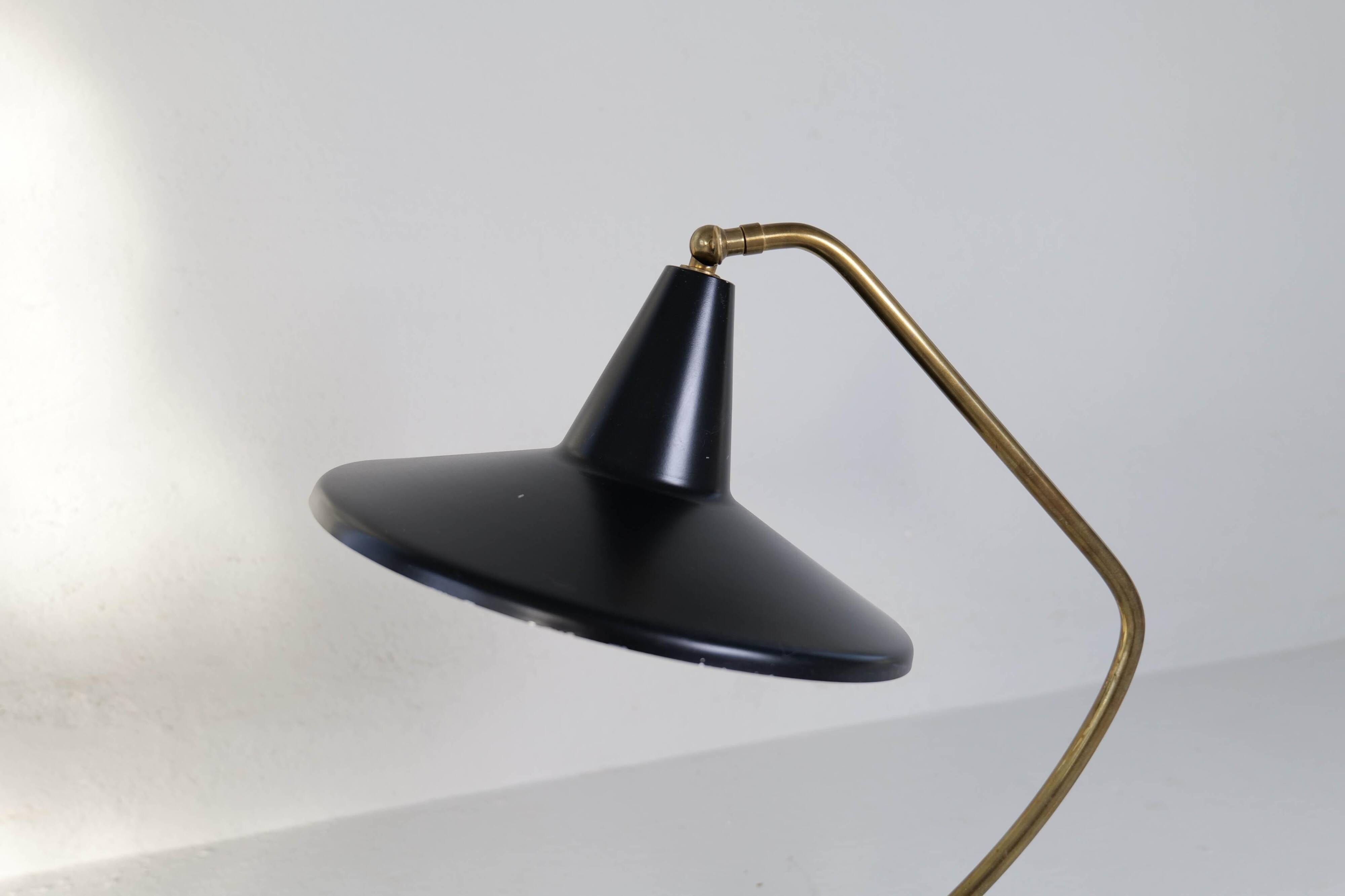 Brass table lamp on a tripod in modern Swedish style, Sweden, 1950.