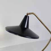 Brass table lamp on a tripod in modern Swedish style, Sweden, 1950.
