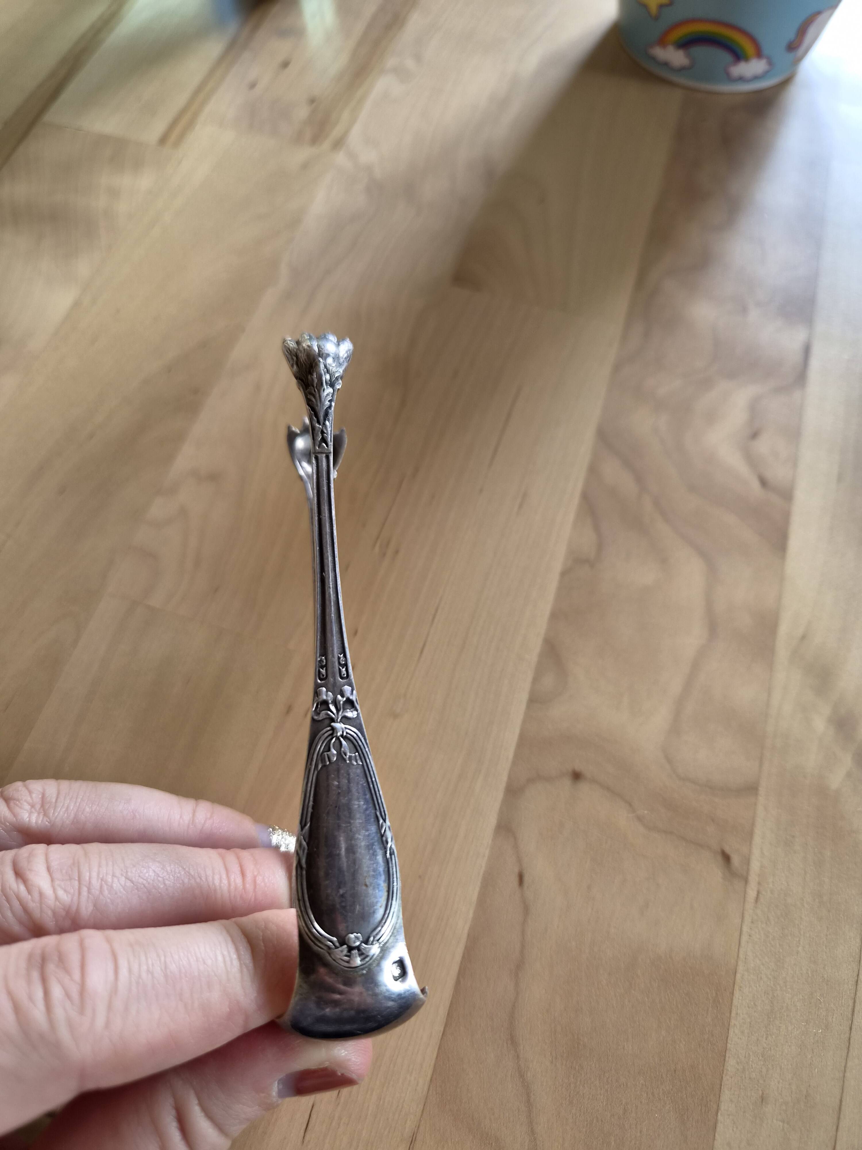Sugar tongs from the Christofle Art Nouveau house.