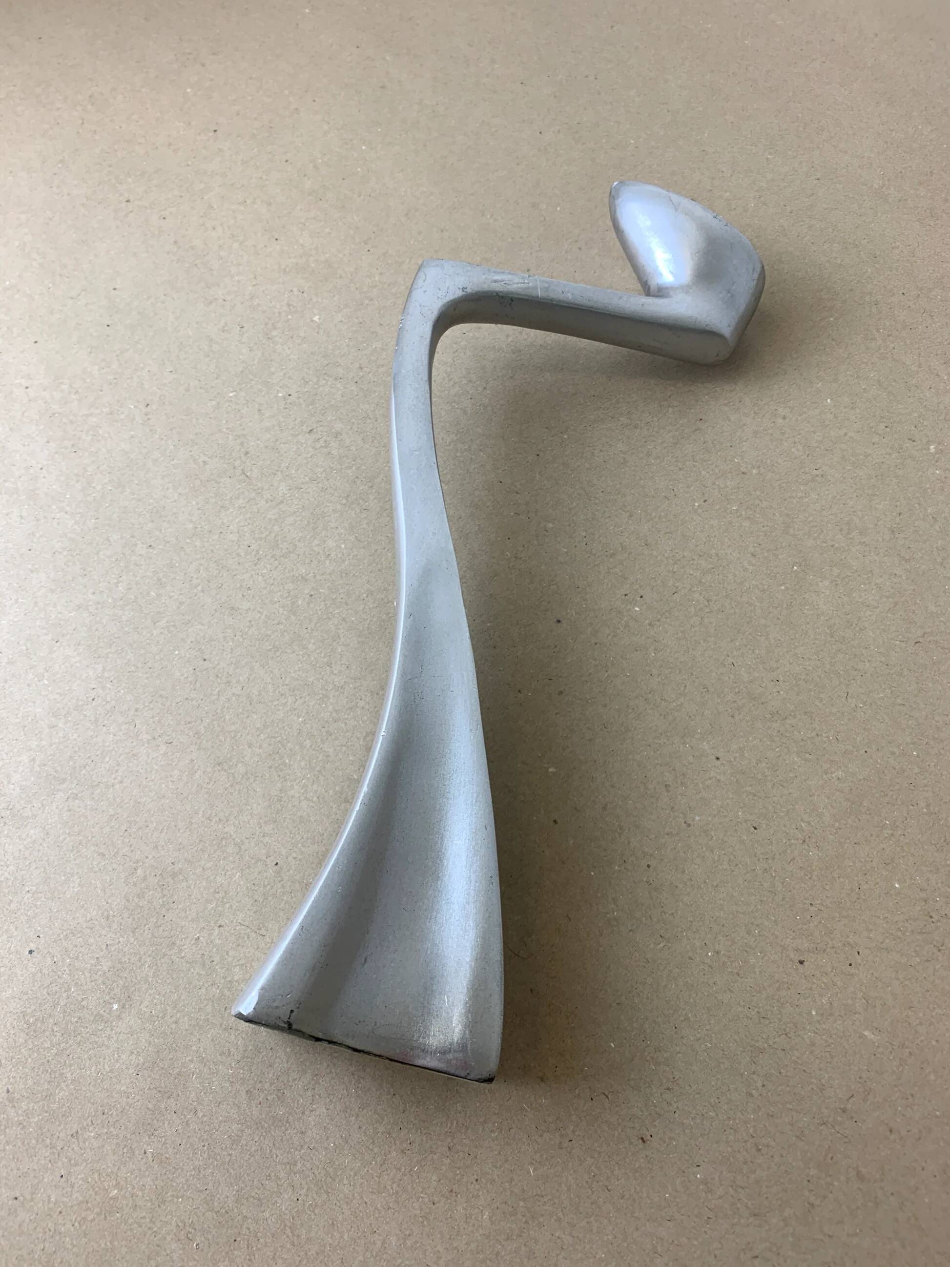 Swan candlestick by Matthew Hilton, solid aluminium, England, 1980s