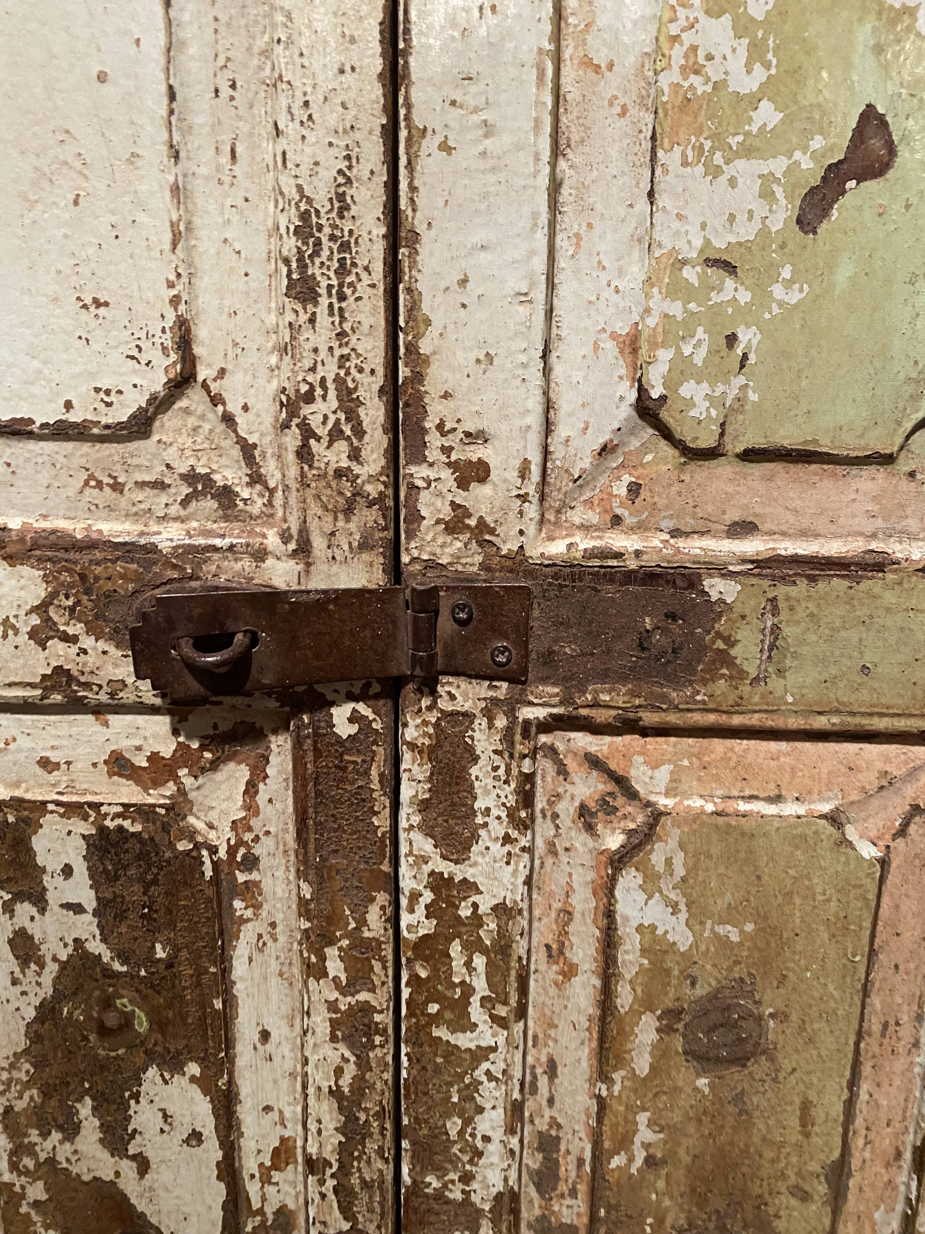 Indian window in green patinated wood