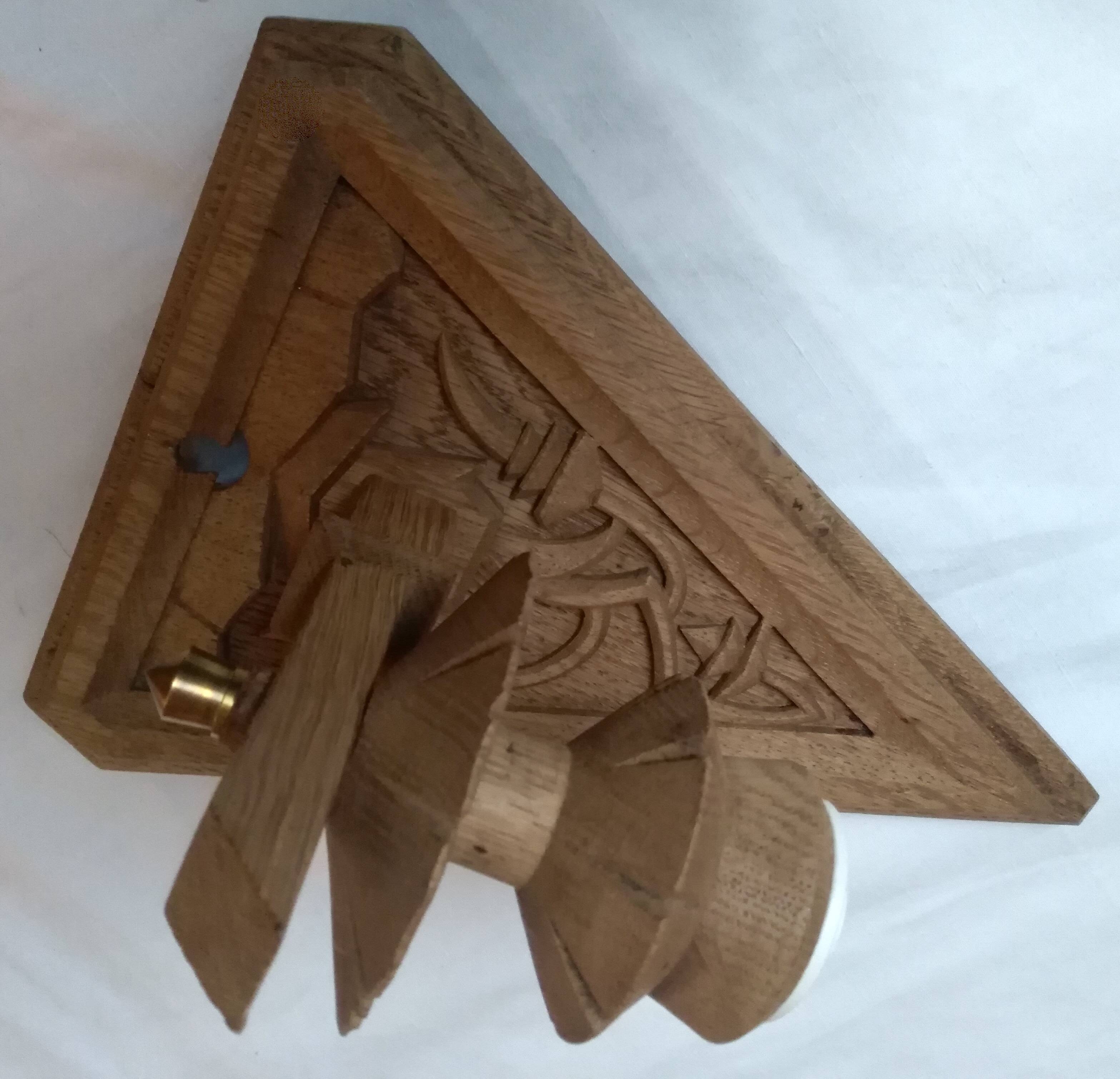 Old hand-carved wooden wall light