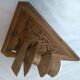 Old hand-carved wooden wall light