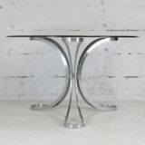 Living room table "Space Age" polished steel, circular slab smoked glass. France, circa 1970.