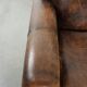 Armchair made of comfortable sheepskin leather in Art Deco design