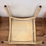 Three stackable rattan and bamboo Maugrion coffee tables