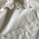 Pair of percale pillowcases embroidered festoons and daisies 1960