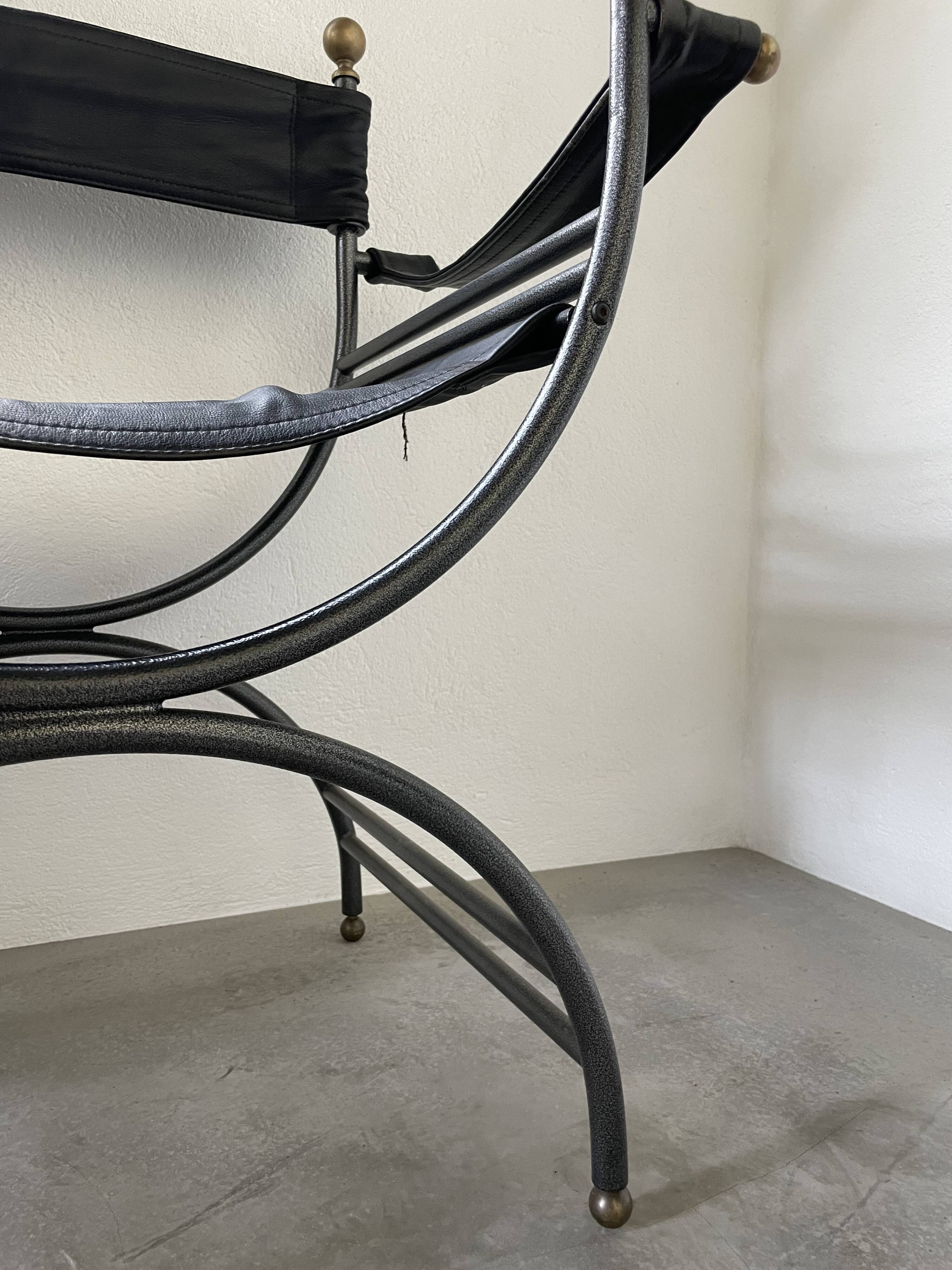 Pair of leather “curule” emperor armchairs