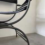 Pair of leather “curule” emperor armchairs
