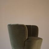 Curved Danish club chair from the mid-century, in the style of Viggo Boesen, 1940s.