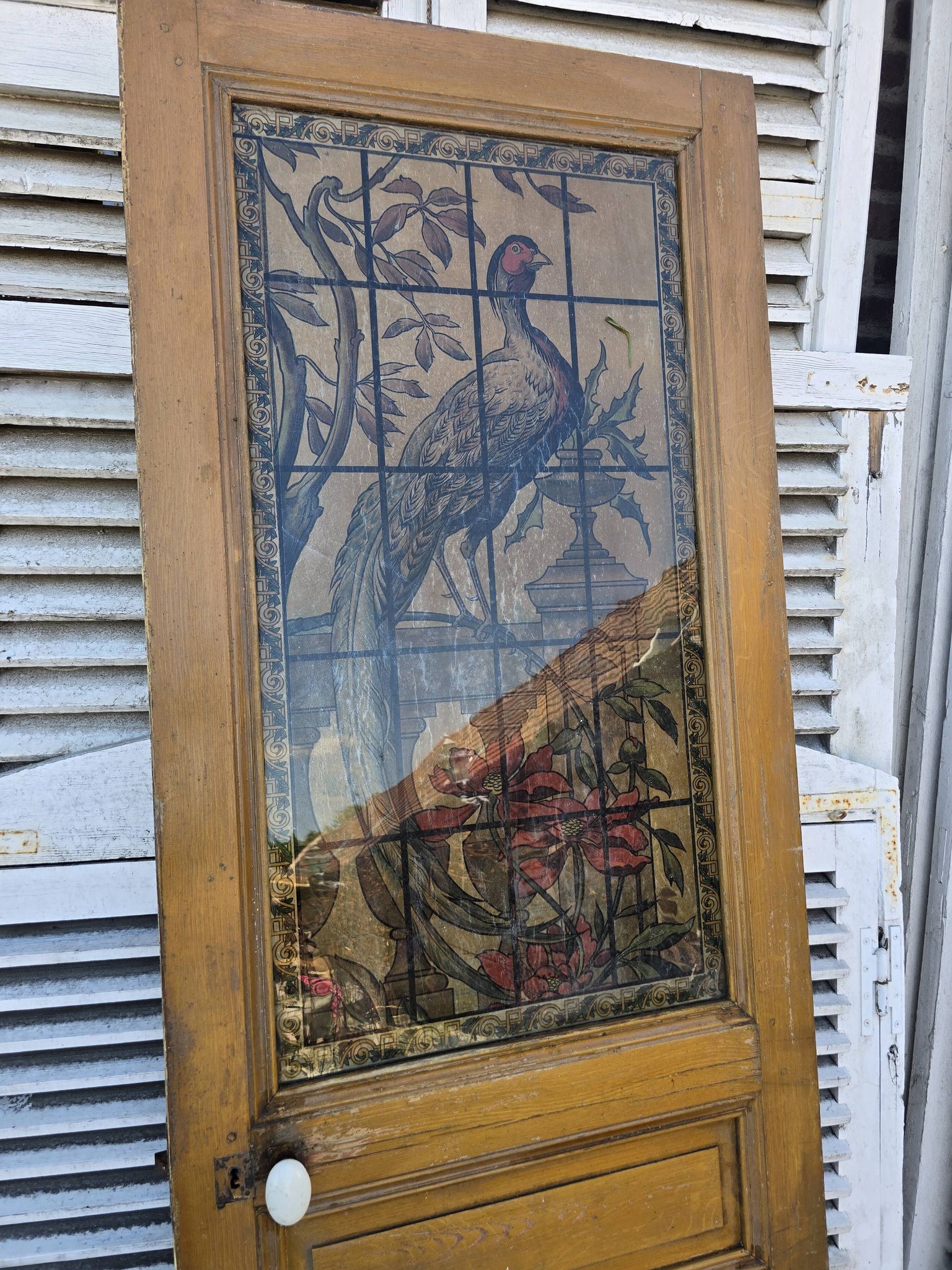 old door with decorated window