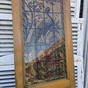 old door with decorated window