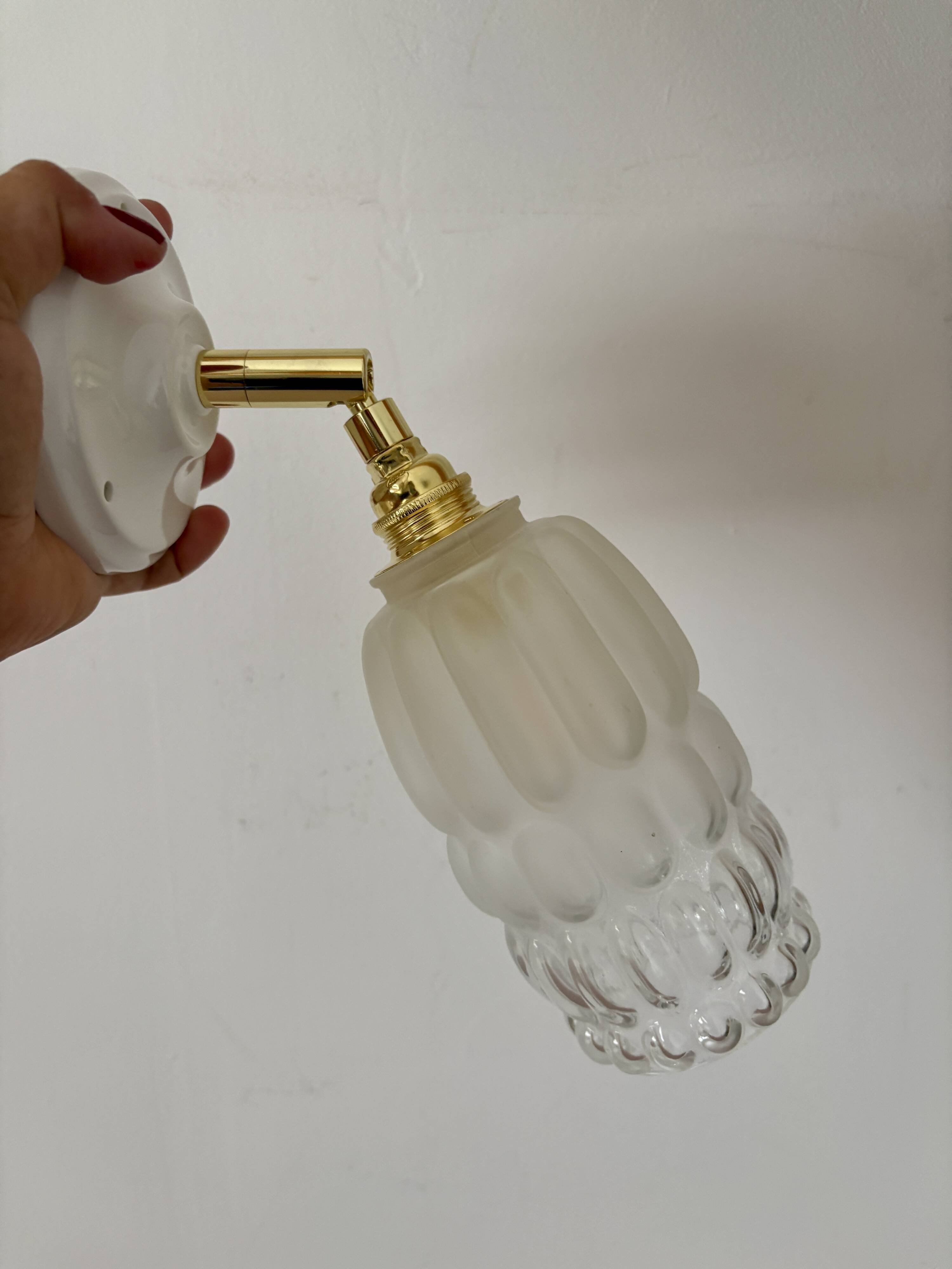 Vintage globe wall lamp in half frosted, half transparent glass