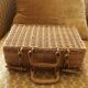 Vintage wicker suitcase